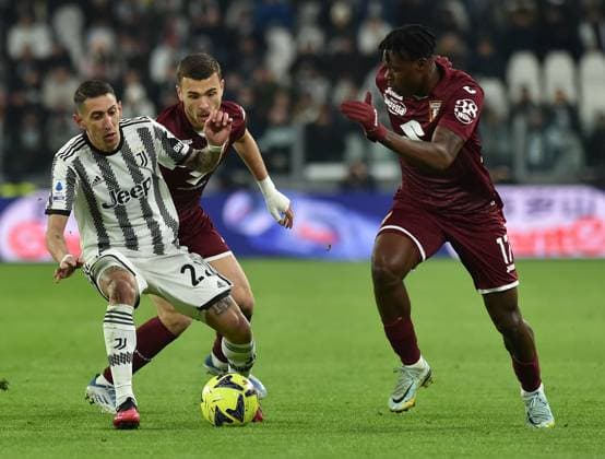(230301) -- TURIN, March 1, 2023 -- FC Juventus Angel Di Maria (L) vies with Torino s Alessandro Buongiorno (C) and Wilfred Singh during a Serie A football match in Turin, Italy, Feb. 28, 2023. (Photo by Xinhua) (SP)ITALY-TURIN-FOOTBALL-SERIE A-JUVENTUS VS TORINO FedericoxTardito 