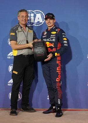 Formula 1 Gulf Air Bahrain Grand Prix 2023 04 03 2023, Bahrain International Circuit, Sakhir, Formula 1 Gulf Air Bahrain Grand Prix 2023 ,in picture Max Verstappen NLD , Oracle Red Bull Racing gets the trophy for pole position from Pirelli motorsport chief Mario Isola nordphotoxGmbHx xBratic nph00250