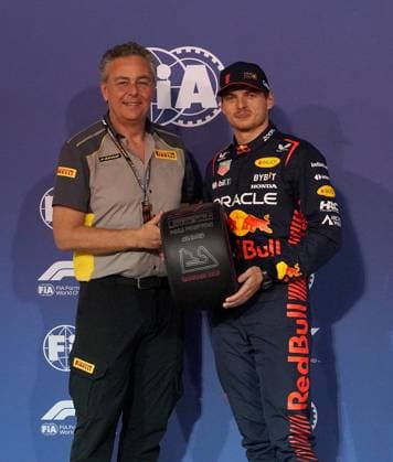 Formula 1 Gulf Air Bahrain Grand Prix 2023 04 03 2023, Bahrain International Circuit, Sakhir, Formula 1 Gulf Air Bahrain Grand Prix 2023 ,in picture Max Verstappen NLD , Oracle Red Bull Racing gets the trophy for pole position from Pirelli motorsport chief Mario Isola nordphotoxGmbHx xBratic nph00250