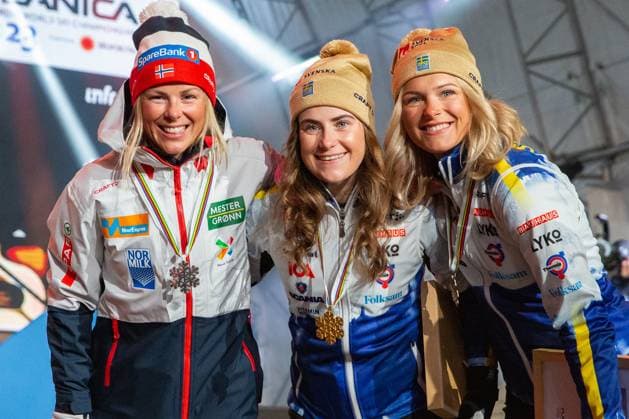 NORDIC SKIING - FIS Nordic WC Planica 2023 KRANJSKA GORA,SLOVENIA,04.MAR.23 - NORDIC SKIING, CROSS COUNTRY SKIING - FIS Nordic World Ski Championships, 30km classic, mass start, ladies, medal plaza, award ceremony. Image shows Anne Kjersti Kalvaa (NOR), Ebba Andersson and Frida Karlsson (SWE).  GEPAxpictures xGintarexKarpaviciute
