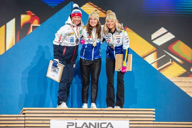 NORDIC SKIING - FIS Nordic WC Planica 2023 KRANJSKA GORA,SLOVENIA,04.MAR.23 - NORDIC SKIING, CROSS COUNTRY SKIING - FIS Nordic World Ski Championships, 30km classic, mass start, ladies, medal plaza, award ceremony. Image shows Anne Kjersti Kalvaa (NOR), Ebba Andersson and Frida Karlsson (SWE).  GEPAxpictures xGintarexKarpaviciute