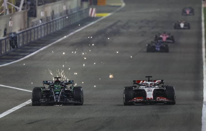 63 RUSSELL George (gbr), Mercedes AMG F1 Team W14, action with 20 MAGNUSSEN Kevin (den), Haas F1 Team VF-23 Ferrari during the Formula 1 Gulf Air Bahrain Grand Prix 2023, 1st round of the 2023 FIA Formula One World Championship, WM, Weltmeisterschaft from March 2 to 5, 2023 on the Bahrain International Circuit, in Sakhir, Bahrain - F1 - BAHRAIN GRAND PRIX 2023 - RACE DPPI Panoramic  G0OD3163