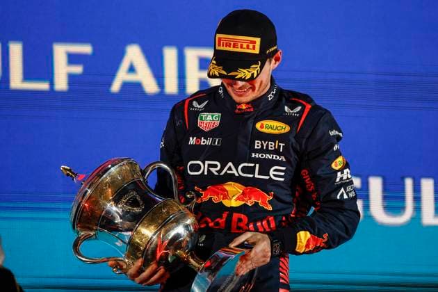 VERSTAPPEN Max (ned), Red Bull Racing RB19, portrait celebrates his victory with the trophy at the podium during the Formula 1 Gulf Air Bahrain Grand Prix 2023, 1st round of the 2023 FIA Formula One World Championship, WM, Weltmeisterschaft from March 2 to 5, 2023 on the Bahrain International Circuit, in Sakhir, Bahrain - F1 - BAHRAIN GRAND PRIX 2023 - RACE DPPI Panoramic  00123003__R3_2082