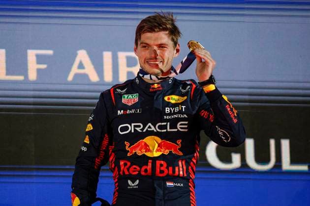 VERSTAPPEN Max (ned), Red Bull Racing RB19, portrait celebrates his victory with the trophy at the podium during the Formula 1 Gulf Air Bahrain Grand Prix 2023, 1st round of the 2023 FIA Formula One World Championship, WM, Weltmeisterschaft from March 2 to 5, 2023 on the Bahrain International Circuit, in Sakhir, Bahrain - F1 - BAHRAIN GRAND PRIX 2023 - RACE DPPI Panoramic  00123003__R3_2101