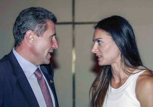 Beijing, Greece. Former Soviet athlete, member of the Committee of Youth Policy, Physical Education, Sports and Tourism of the Verkhovna Rada of Ukraine Sergei Bubka and Russian athlete Yelena Isinbayeva (gold medal in pole vault) have a conversation during the 2006 IAAF World Cup. Robert Maximov TASS  57396198