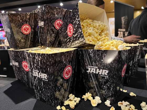 Popcorn in the design of the Europa League Cup in the cinema at the movie premiere Frankfurt 08 03 2023 movie premiere This year of Eintracht Frankfurt.