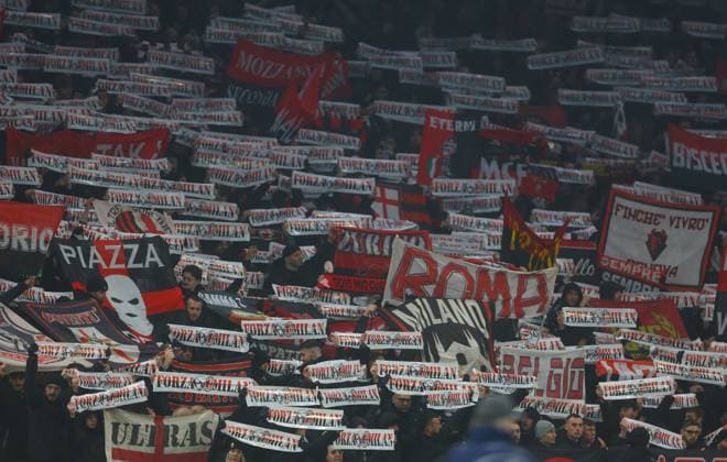 Mandatory Credit: Photo by Kieran McManus Shutterstock (13794852ce) AC Milan fans hold scarves in the air Tottenham Hotspur v AC Milan, UEFA Champions League, Round of 16, Second Leg, Football, Tottenham Hotspur Stadium, London, UK - 08 Mar 2023 EDITORIAL USE ONLY No use with unauthorised audio, video, data, fixture lists, club league logos or live services. Online in-match use limited to 120 images, no video emulation. No use in betting, games or single club league player publications. Tottenham Hotspur v AC Milan, UEFA Champions League, Round of 16, Second Leg, Football, Tottenham Hotspur Stadium, London, UK - 08 Mar 2023 EDITORIAL USE ONLY No use with unauthorised audio, video, data, fixture lists, club league logos or live services. Online in-match use limited to 120 images, no video emulation. No use in betting, games or single club league player publications.  Copyright: xKieranxMcManus Shutterstockx 13794852ce