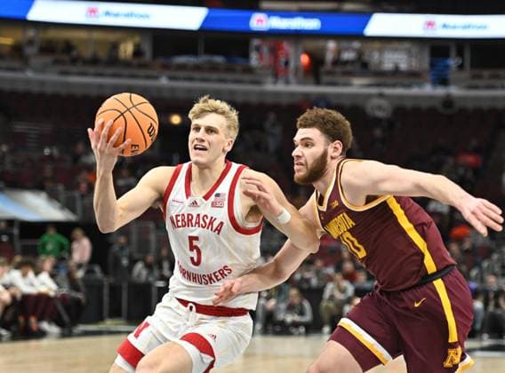 March 08, 2023: Nebraska Cornhuskers guard Sam Griesel (5)drives to the basket while being guarded by Minnesota Golden Gophers forward Jamison Battle (10) during the first round of the NCAA, College League, USA Big Ten Conference Men s Basketball Tournament game at United Center in Chicago, Illinois. CSM. Chicago USA - ZUMAc04_ 20230308_zaf_c04_117 Copyright: xDeanxReidx