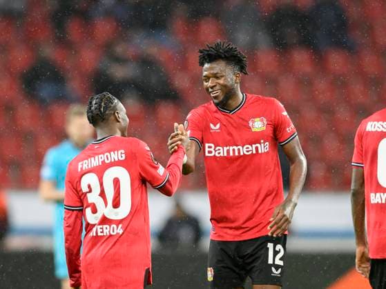 Final cheer LEV, f l Jeremie FRIMPONG LEV Edmond TAPSOBA LEV Football Europa League, Round of 16 first leg, Bayer 04 Leverkusen LEV Ferencvaros Budapest BUD , on 09 03 2023 in Leverkusen Germany UEFA regulations prohibit any use of photographs as image sequences and or quasi video Â