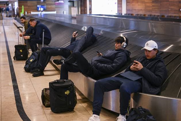 Union s players pictured waiting at the airport due to a cancelled flight after a soccer game between German Union Berlin and Belgian Royale Union Saint-Gilloise, Thursday 09 March 2023 in Berlin, Germany, the first leg of the round of 16 of the UEFA Europa League competition. LAURIExDIEFFEMBACQ  x62304126x