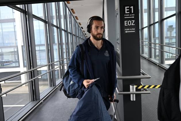 Union s Christian Burgess boards the airplane before the departure of Belgian soccer team Royale Union Saint-Gilloise, from the airport in Berlin, Germany to Zaventem, Belgium on Friday 10 March 2023. Union is traveling home after yesterday s game against German Union Berlin, the first leg of the round of 16 of the UEFA Europa League competition which ended in a 3-3 draw. LAURIExDIEFFEMBACQ  x62390480x