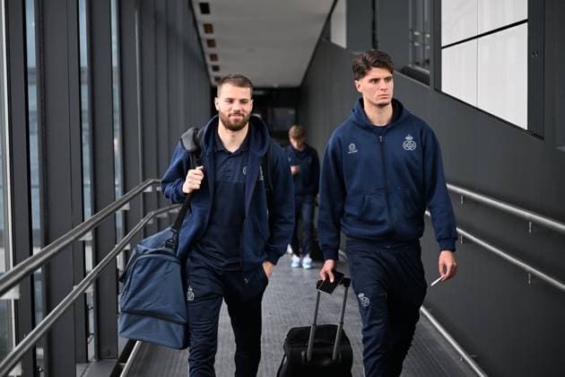 Union s Bart Nieuwkoop and Union s Oussama El Azzouzi board the airplane for the departure of Belgian soccer team Royale Union Saint-Gilloise, from the airport in Berlin, Germany to Zaventem, Belgium on Friday 10 March 2023. Union is traveling home after yesterday s game against German Union Berlin, the first leg of the round of 16 of the UEFA Europa League competition which ended in a 3-3 draw. LAURIExDIEFFEMBACQ  x62391687x