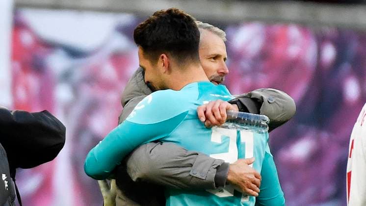 Soccer Bundesliga, season 2022 2023, 24 matchday, RB Leipzig vs VfL 1900 Borussia Mönchengladbach 11 03 2023 3 0 0 0 Marco Rose coach RB Leipzig re hugs Janis Blaswich goalkeeper RB Leipzig, back number 21, 21 li during the Bundesliga match Leipzig vs Mönchengladbach 11 03 2023 Blaswich had held in the match a foul penalty Leipzig Saxony Germany Red Bull Arena