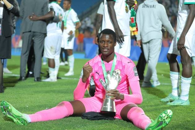 Bilder des Jahres 2023, Sport 03 März Sport Themen der Woche KW10 Sport Bilder des Tages Egypt, Cairo, 11 March 2023 - Landing Badji of Senegal celebrates with golden glove trophy for best goalkeeper after winning the match between Senegal and The Gambia at the FINAL of under 20 Africa Cup of Nations Egypt 2023 at Cairo International Stadium. Photo SFSI Eslam Osama FINAL - Under 20 Africa Cup of Nations Egypt 2023 - Senegal under 20 v The Gambia under 20 Copyright: xSFSI EslamxOsamax