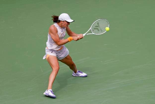 March 11, 2023 Iga Swiatek of Poland returns a shot to Claire Liu during the 2023 BNP Paribas Open at Indian Wells Tennis Garden in Indian Wells, California. Mandatory Photo Credit: CSM Indian Wells United States of America - ZUMAc04_ 20230311_zaf_c04_244 Copyright: xCharlesxBausx