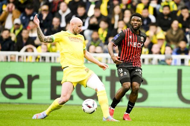Terem Moffi (Nice) vs Nicolas Pallois (Nantes) FOOTBALL : Nantes vs Nice - Ligue1 - 12 03 2023 JBAutissier Panoramic 