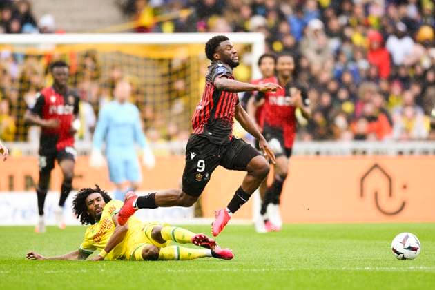 Terem Moffi (Nice) vs Samuel Moutoussamy (Nantes) FOOTBALL : Nantes vs Nice - Ligue1 - 12 03 2023 JBAutissier Panoramic 