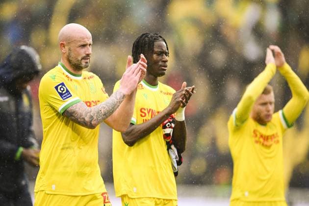 Nicolas Pallois (Nantes) Stredair Appuah (Nantes) en fin de match saluant le public Nantais FOOTBALL : Nantes vs Nice - Ligue1 - 12 03 2023 JBAutissier Panoramic 