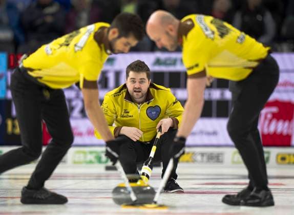 March 12, 2023, London, ON, Canada: Manitoba s Matt Dunstone calls a sweep on a shot against Wild Card 1 s Brendan Bottcher in the semifinal game at the 2023 Tim Hortons Brier in London, Ont., Sunday, March 12, 2023. Canada News - March 12, 2023  - ZUMAc35_ 20230312_zaf_c35_009 Copyright: xFrankxGunnx