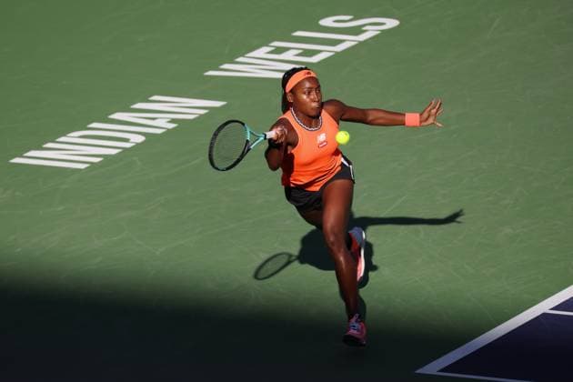 INDIAN WELLS, CA - MARCH 12: Coco Gauff (USA) stretches for a forehand during the BNP Paribas Open on March 12, 2023 at the Indian Wells Tennis Garden in Indian Wells, CA. (Photo by George Walker Icon Sportswire) TENNIS: MAR 12 BNP Paribas Open Icon230312081