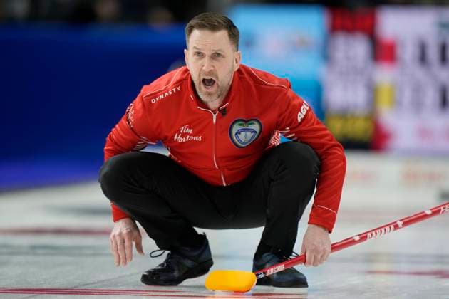 March 12, 2023, London, ON, Canada: Team Canada s Brad Gushue calls to his sweepers as they make a three against Team Manitoba in the eighth end during the finals at the 2023 Tim Hortons Brier in London, Ont., Sunday, March 12, 2023. Canada News - March 12, 2023  - ZUMAc35_ 20230312_zaf_c35_022 Copyright: xFrankxGunnx