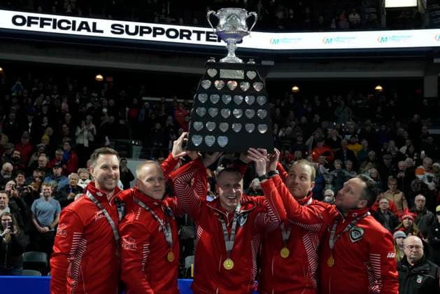 March 12, 2023, London, ON, Canada: Team Canada skip Brad Gushue, left to right, celebrates with teammates Mark Nichols, EJ Harnden, Geoff Walker and Caleb Flaxey after defeating Team Manitoba in the finals of the 2023 Tim Hortons Brier in London, Ont., Sunday, March 12, 2023. It s Gushue s fifth Tim Hortons Brier crown in the last seven years. Canada News - March 12, 2023 - ZUMAc35_ 20230312_zaf_c35_040 Copyright: xFrankxGunnx