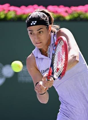 INDIAN WELLS, CA - MARCH 13: Caroline Garcia of France returns the ball during a tennis match at the BNP Paribas Open played on March 13, 2023 at the Indian Wells Tennis Garden in Indian Wells, CA. (Photo by John Cordes Icon Sportswire) TENNIS: MAR 13 BNP Paribas Open Icon506230313019