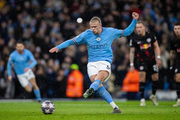 (230315) -- MANCHESTER, March 15, 2023 -- Manchester City s Erling Haaland scores the opening goal from the penalty spot during the UEFA Champions League Round of 16 2nd Leg match between Manchester City and Leipzig in Manchester, Britain, on March 14, 2023. (SP)BRITAIN-MANCHESTER-FOOTBALL-UEFA CHAMPIONS LEAGUE-ROUND OF 16-MANCHESTER CITY VS LEIPZIG LixYing 