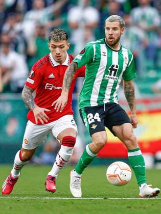 Mandatory Credit: Photo by Pressinphoto Shutterstock (13830498g) Aitor Ruibal of Real Betis and Lisandro Martinez of Manchester United, ManU Real Betis v Manchester United, UEFA Europa League, Round of 16, 2nd leg. Football, Benito Villamarin Stadium, Sevilla, Spain - 16 March 2023 Editorial use only Real Betis v Manchester United, UEFA Europa League, Round of 16, 2nd leg. Football, Benito Villamarin Stadium, Sevilla, Spain - 16 March 2023 Editorial use only Copyright: xPressinphoto Shutterstockx 13830498g