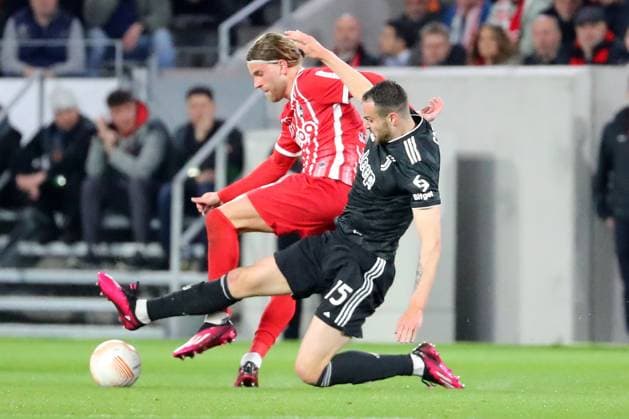 16 03 2023, xtvx, football UEFA Europa League 1 8 final, SC Freiburg Juventus Turin emspor, v l Lucas Hoeler SC Freiburg Federico Gatti Juventus Turin duel, action, action, battle for the ball DFL DFB REGULATIONS PROHIBIT ANY USE OF PHOTOGRAPHS AS IMAGE SEQUENCES AND OR QUASI VIDEO Freiburg