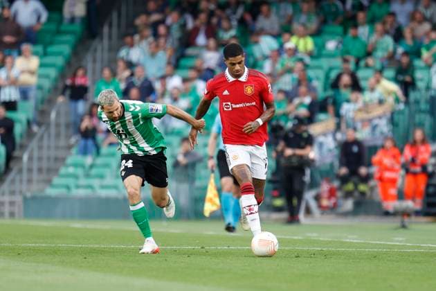 March 16, 2023, Seville, Spain: MARCUS RASHFORD of Manchester United, ManU (R) vies for the ball with AITOR RUIBAL of Betis (L) during the Europa League Round of 16 (2st leg) soccer match between Real Betis and Manchester United at the Ramon Sanchez Pizjuan Stadium Seville Spain - ZUMAa142 20230316_zap_a142_002 Copyright: xDanielxGonzalezxAcunax