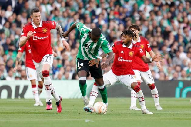 March 16, 2023, Seville, Spain: WILLIAM CARVALHO of Betis (L) vies for the ball with FRED of Manchester United, ManU (R) during the Europa League Round of 16 (2st leg) soccer match between Real Betis and Manchester United at the Ramon Sanchez Pizjuan Stadium Seville Spain - ZUMAa142 20230316_zap_a142_010 Copyright: xDanielxGonzalezxAcunax