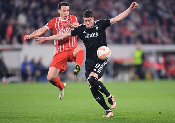 FOOTBALL EUROPE LEAGUE SEASON 2022 2023 Round of 16 Second leg SC Freiburg Juventus Turin 16 03 2022 Dusan Vlahovic right, Juventus Turin vs Nicolas Hoefler left, SC Freiburg