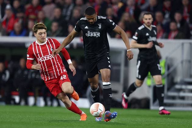 Sc Freiburg - Juventus Fc Gleison Bremer of Juventus Fc and Ritsu Daan of Sc Freiburg battle for the ball during the Uefa Europa League round of 16 second leg match beetween Sc Freiburg and Juventus Fc at Stade Europa-Park on March 16 2023 in Freiburg, Germany . Freiburg Stade Europa-Park Germany Copyright: xMarcoxCanonierox