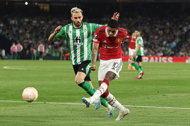 Mandatory Credit: Photo by Paul Currie Shutterstock (13820133as) Marcus Rashford of Manchester United, ManU shoot at goal Real Betis v Manchester United, UEFA Europa League, Round of 16, Second Leg, Football, Benito Villamarin Stadium, Seville, Spain - 16 Mar 2023 EDITORIAL USE ONLY No use with unauthorised audio, video, data, fixture lists, club league logos or live services. Online in-match use limited to 120 images, no video emulation. No use in betting, games or single club league player publications. Real Betis v Manchester United, UEFA Europa League, Round of 16, Second Leg, Football, Benito Villamarin Stadium, Seville, Spain - 16 Mar 2023 EDITORIAL USE ONLY No use with unauthorised audio, video, data, fixture lists, club league logos or live services. Online in-match use limited to 120 images, no video emulation. No use in betting, games or single club league player publications. Copyright: xPaulxCurrie Shutterstockx 13820133as