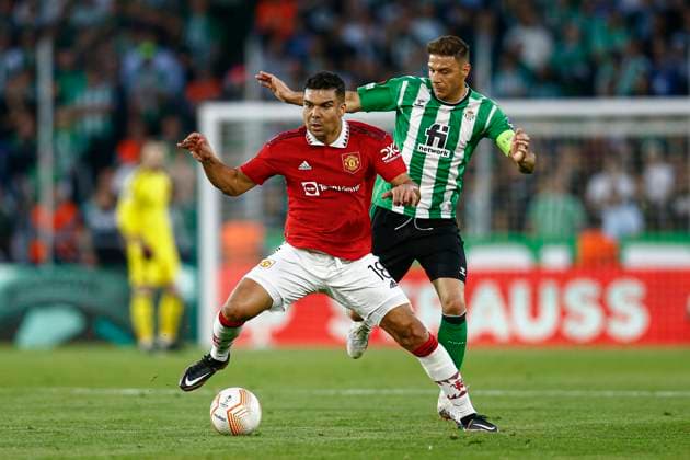 ESP: Sevilla FC Manchester United, ManU UEFA Europa League, round of 16. Carlos Henrique Casemiro of Manchester United and Joaquin Sanchez of Real Betis during the UEFA Europa League match, Round of 16, 2nd leg, between Real Betis and Manchester United played at Benito Villamarin Stadium on March 16, 2023 in Sevilla, Spain. kpng Copyright: xAntonioxPozox xPRESSINx PS_230316_766