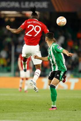 March 16, 2023, Seville, Spain: AARON WAN-BISSAKA of Manchester United, ManU (L) in action during the Europa League Round of 16 (2st leg) soccer match between Real Betis and Manchester United at the Ramon Sanchez Pizjuan Stadium Seville Spain - ZUMAa142 20230316_zap_a142_028 Copyright: xDanielxGonzalezxAcunax