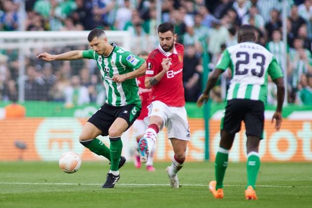 March 16, 2023, SEVILLA, SEVILLA, SPAIN: Guido Rodriguez of Real Betis and Bruno Fernandes of Manchester United, ManU in action during the UEFA Europa League round of 16 second leg match between Real Betis and Manchester United at Benito Villamarin Stadium on March 16, 2023 in Sevilla, Spain. SEVILLA SPAIN - ZUMAa181 20230316_zaa_a181_024 Copyright: xJoaquinxCorcherox