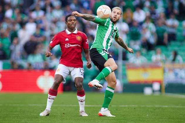 March 16, 2023, SEVILLA, SEVILLA, SPAIN: Tyrell Malacia of Manchester United, ManU and Aitor Ruibal of Real Betis in action during the UEFA Europa League round of 16 second leg match between Real Betis and Manchester United at Benito Villamarin Stadium on March 16, 2023 in Sevilla, Spain. SEVILLA SPAIN - ZUMAa181 20230316_zaa_a181_029 Copyright: xJoaquinxCorcherox