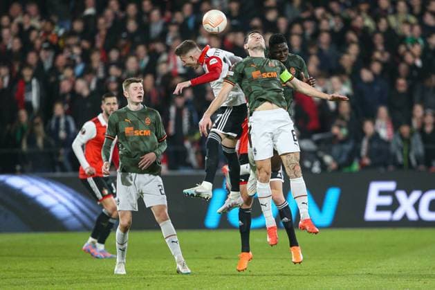 ROTTERDAM, 16-3-2023, Stadium de Kuip, the UEFA Europa League, Feyenoord - Shakhtar Donetsk, Feyenoord player Sebastian SzymaÅ ski, Shakhtar Taras Stepanenko Feyenoord - Shakhtar Donetsk  x20232235x Copyright: