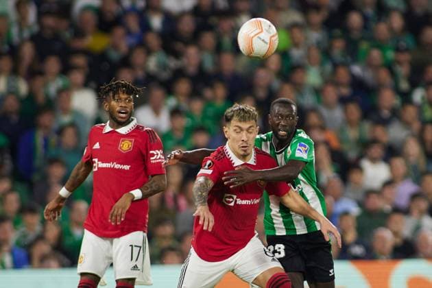 March 16, 2023, SEVILLA, SEVILLA, SPAIN: Lisandro Martinez of Manchester United, ManU and Youssouf Sabaly of Real Betis in action during the UEFA Europa League round of 16 second leg match between Real Betis and Manchester United at Benito Villamarin Stadium on March 16, 2023 in Sevilla, Spain. SEVILLA SPAIN - ZUMAa181 20230316_zaa_a181_047 Copyright: xJoaquinxCorcherox