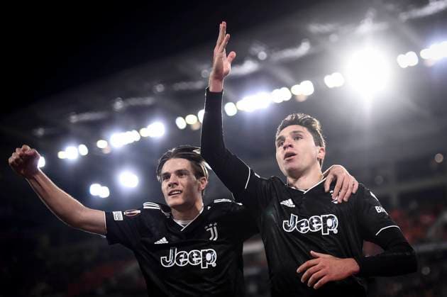 SC Freiburg v Juventus FC - UEFA Europa League Federico Chiesa of Juventus FC celebrates with Nicolo Fagioli of Juventus FC after scoring a goal during the UEFA Europa League round of 16 football match between SC Freiburg and Juventus FC. Freiburg im Breisgau Germany Copyright: xNicolòxCampox