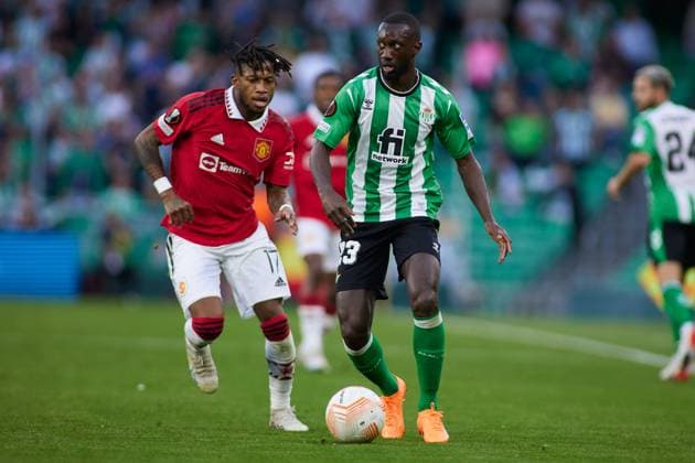 March 16, 2023, SEVILLA, SEVILLA, SPAIN: Fred of Manchester United, ManU and Youssouf Sabaly of Real Betis in action during the UEFA Europa League round of 16 second leg match between Real Betis and Manchester United at Benito Villamarin Stadium on March 16, 2023 in Sevilla, Spain. SEVILLA SPAIN - ZUMAa181 20230316_zaa_a181_026 Copyright: xJoaquinxCorcherox