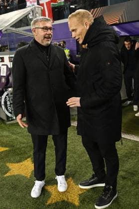 Berlin s head coach Urs Fischer and Union s head coach Karel Geraerts pictured at the start of a soccer game between Belgian Royale Union Saint-Gilloise and German Union Berlin, Thursday 16 March 2023 in Anderlecht, Brussels, the return leg of the round of 16 of the UEFA Europa League competition, after a 3-3 draw result at the first leg. LAURIExDIEFFEMBACQ  x63143619x