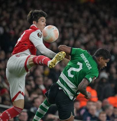 Arsenal v Sporting Clube de Portugal UEFA Europa League Takehiro Tomiyasu of Arsenal and Matheus Reis of Sporting CP battle for the ball during the UEFA Europa League Round of 16 Second Leg match at the Emirates Stadium, London Content Not Available For UK Newspapers Copyright: xNigelxBramleyx FIL-18256-0008 UK Newspapers OUT