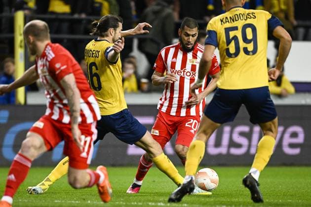 Union s Christian Burgess and Berlin s Aissa Laidouni fight for the ball during a soccer game between Belgian Royale Union Saint-Gilloise and German Union Berlin, Thursday 16 March 2023 in Anderlecht, Brussels, the return leg of the round of 16 of the UEFA Europa League competition, after a 3-3 draw result at the first leg. LAURIExDIEFFEMBACQ  x63144341x