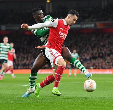 Arsenal v Sporting Clube de Portugal UEFA Europa League Gabriel Martinelli of Arsenal and Ousmande DiomandÃ of Sporting CP battle for the ball during the UEFA Europa League Round of 16 Second Leg match at the Emirates Stadium, London Content Not Available For UK Newspapers Copyright: xNigelxBramleyx FIL-18256-0022 UK Newspapers OUT