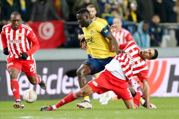 ANDERLECHT, BELGIUM - MARCH 16 : Boniface Victor forward of Union St-Gilloise and Doekhi Danilho defender of Union Berlin during the UEFA Europa League round of 16, 2nd leg between Royal Union Saint-Gilloise and FC Union Berlin on March 16, 2023 in Anderlecht, Belgium, 16 03 2023 ( Royal Union Saint-Gilloise v Union Berlin - UEFA Europa League PhotoNews Panoramic 