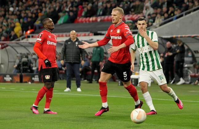 16.03.2023 Budapest(Hungary) Ferencvarosi TC-Bayer 04 Leverkusen Europa League round of 16 men s football Moussa Diaby(L),Mitchel Bakker(C) Bayer 04 Leverkusen react during match beside Amer Gojak (R) Ferencvarosi TC :