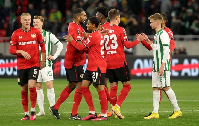 16.03.2023 Budapest(Hungary) Ferencvarosi TC-Bayer 04 Leverkusen Europa League round of 16 men s football Mitchel Bakker(L),Jonathan Tah(3L),Amine Adli(4L) Bayer 04 Leverkusen celebrate victory after match between Nikolai Baden Frederiksen (2L),Balazs Manner(R) Ferencvarosi TC :
